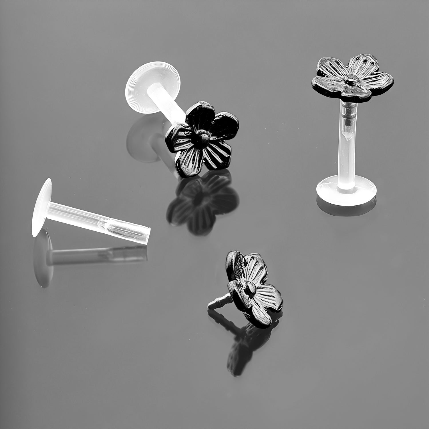 Push-In Bioflex Labret mit Black Steel Top im Blumen Design - Stärke 1.2mm Länge 8mm