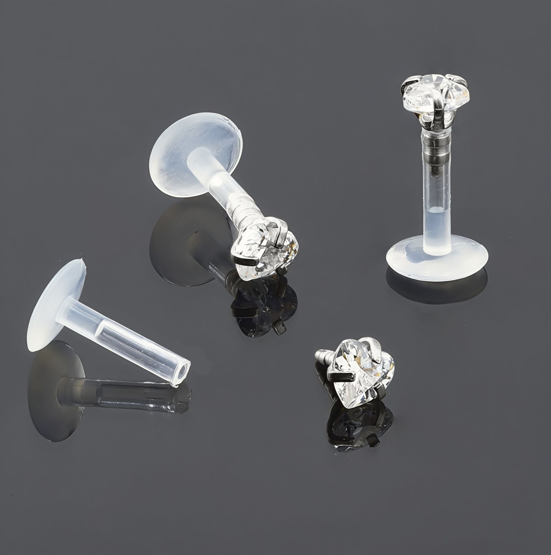 Push-In Bioflex Labret mit Steel Top und 4mm Kristall in Herz Design mit Krabbenfassung - Stärke 1.2mm Länge 8mm - CC Kristallklar