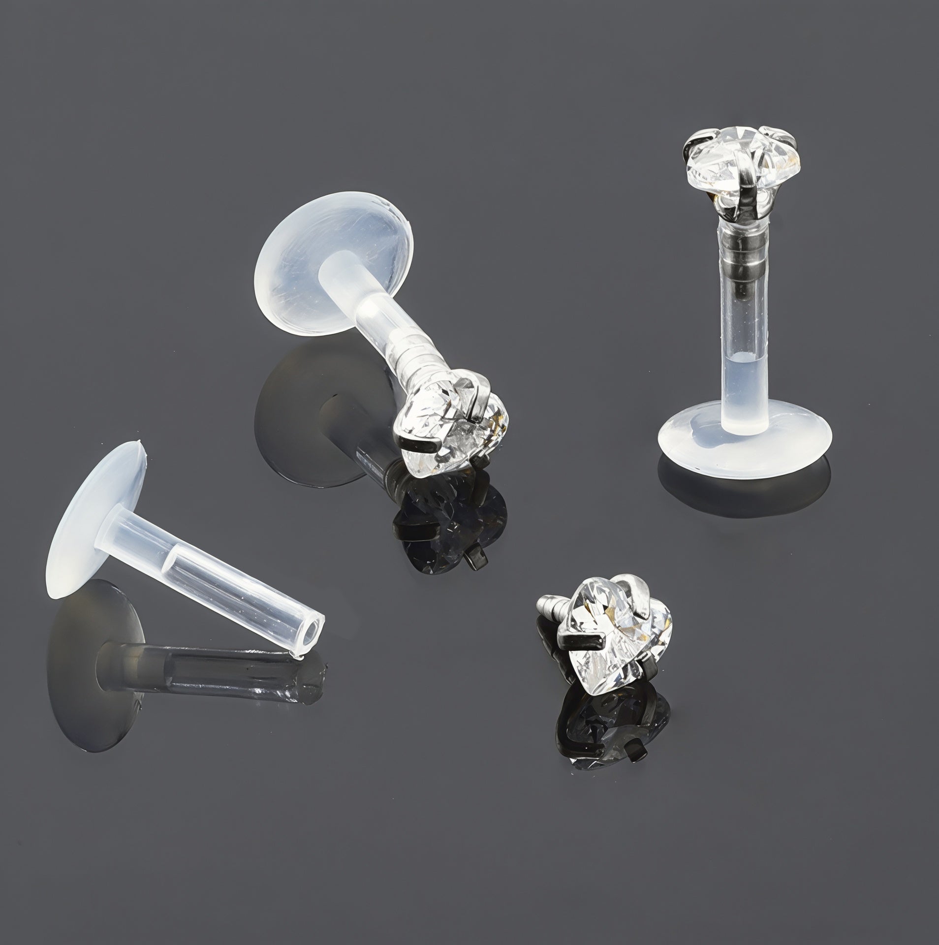 Push-In Bioflex Labret mit Steel Top und 4mm Kristall in Herz Design mit Krabbenfassung - Stärke 1.2mm Länge 8mm - CC Kristallklar