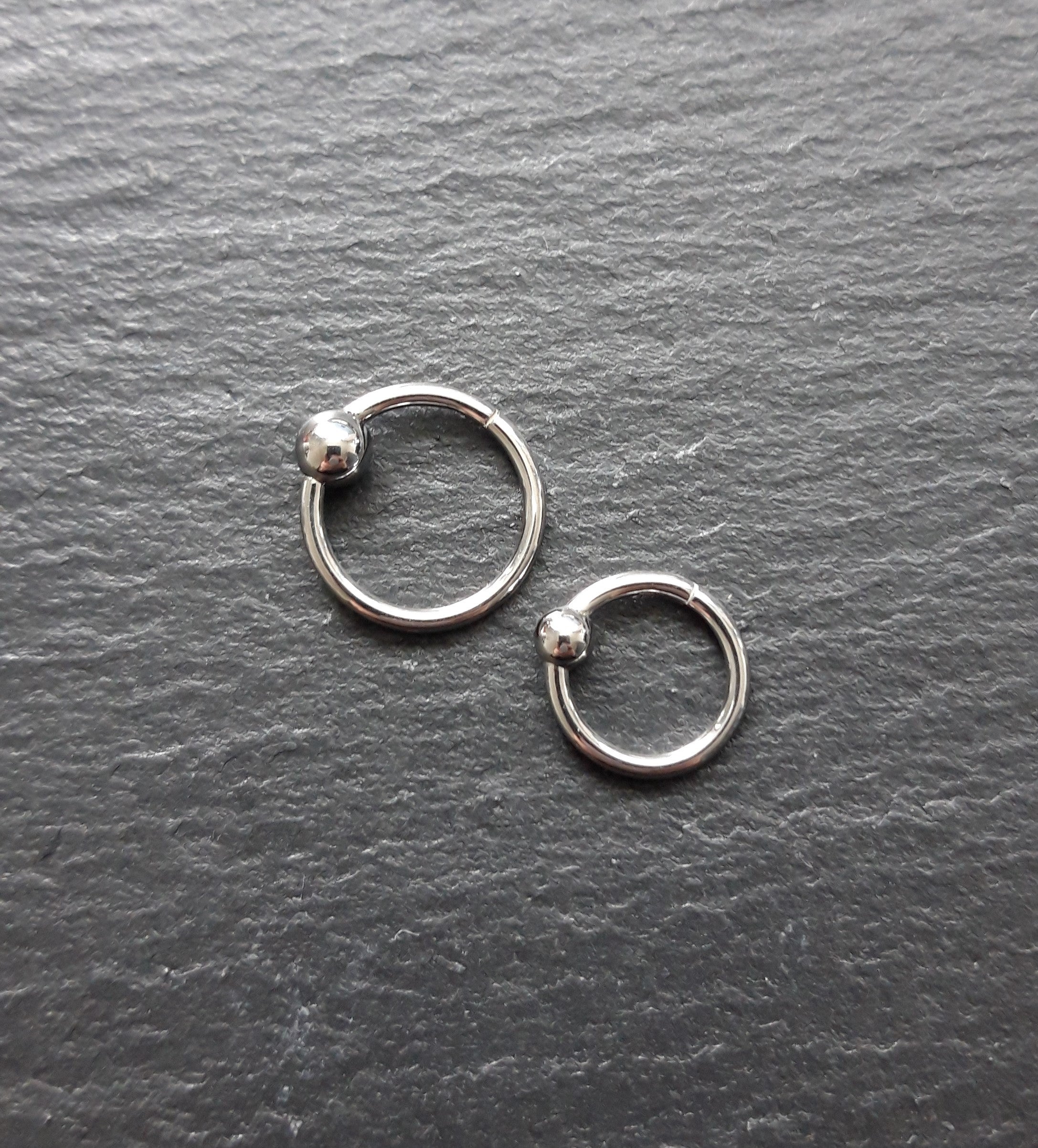Steel Segment Ring Clicker with ball - thickness 1.2mm