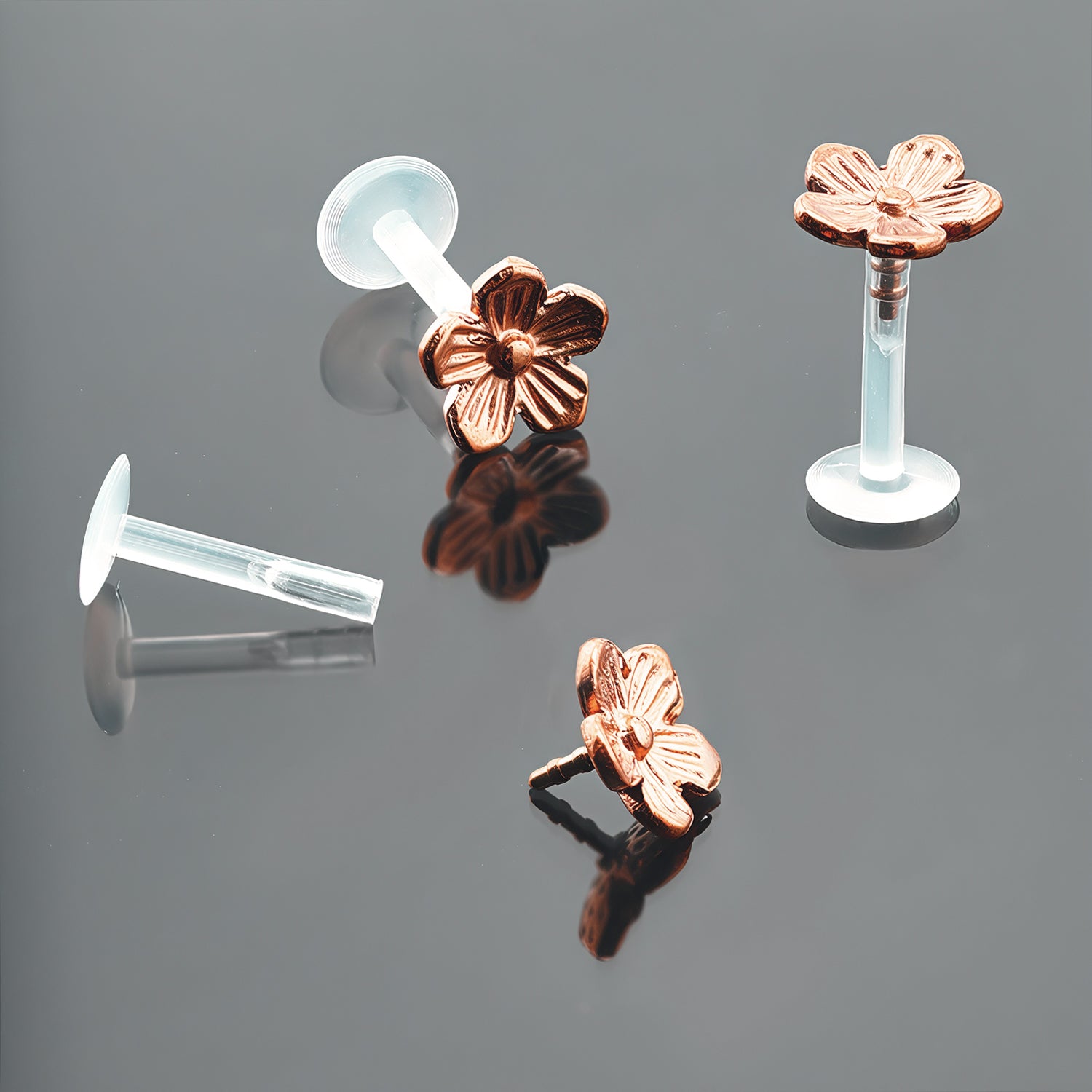 Push-In Bioflex Labret mit Rose Gold Steel Top im Blumen Design - Stärke 1.2mm Länge 8mm